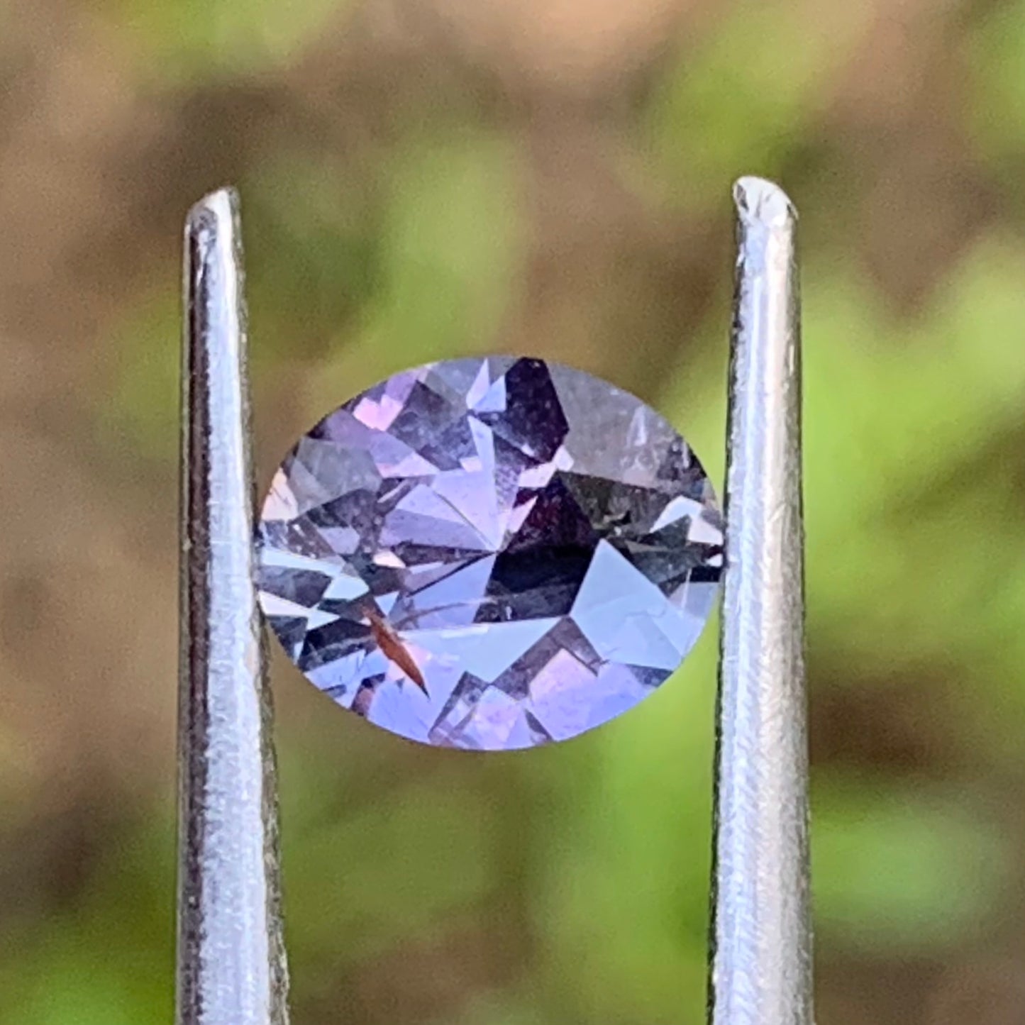 Bi Color Sapphire Purple - Brown Oval Cut 0.75 Ct Natural Heated Only Loose Gemstone from Sri Lanka