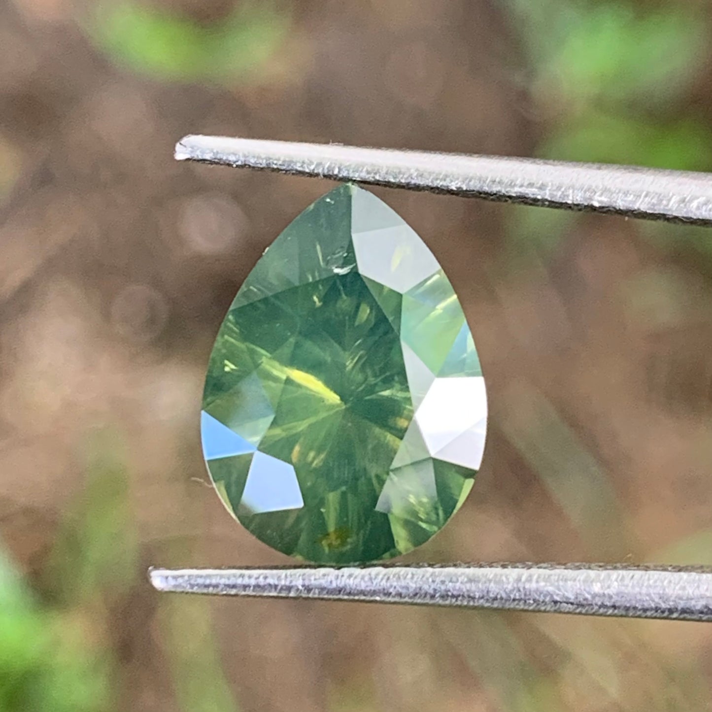 Green Zircon Concave Cut / Fantasy Cut Pear 4.79 Ct Natural Loose Gemstone From Sri Lanka
