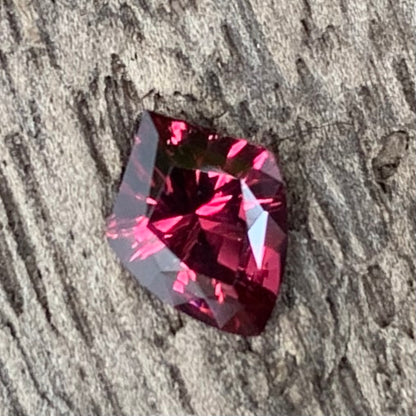 Red Garnet Fantasy / Concave Cut Shield 0.58 Ct Natural Loose Gemstone For Jewelry Making