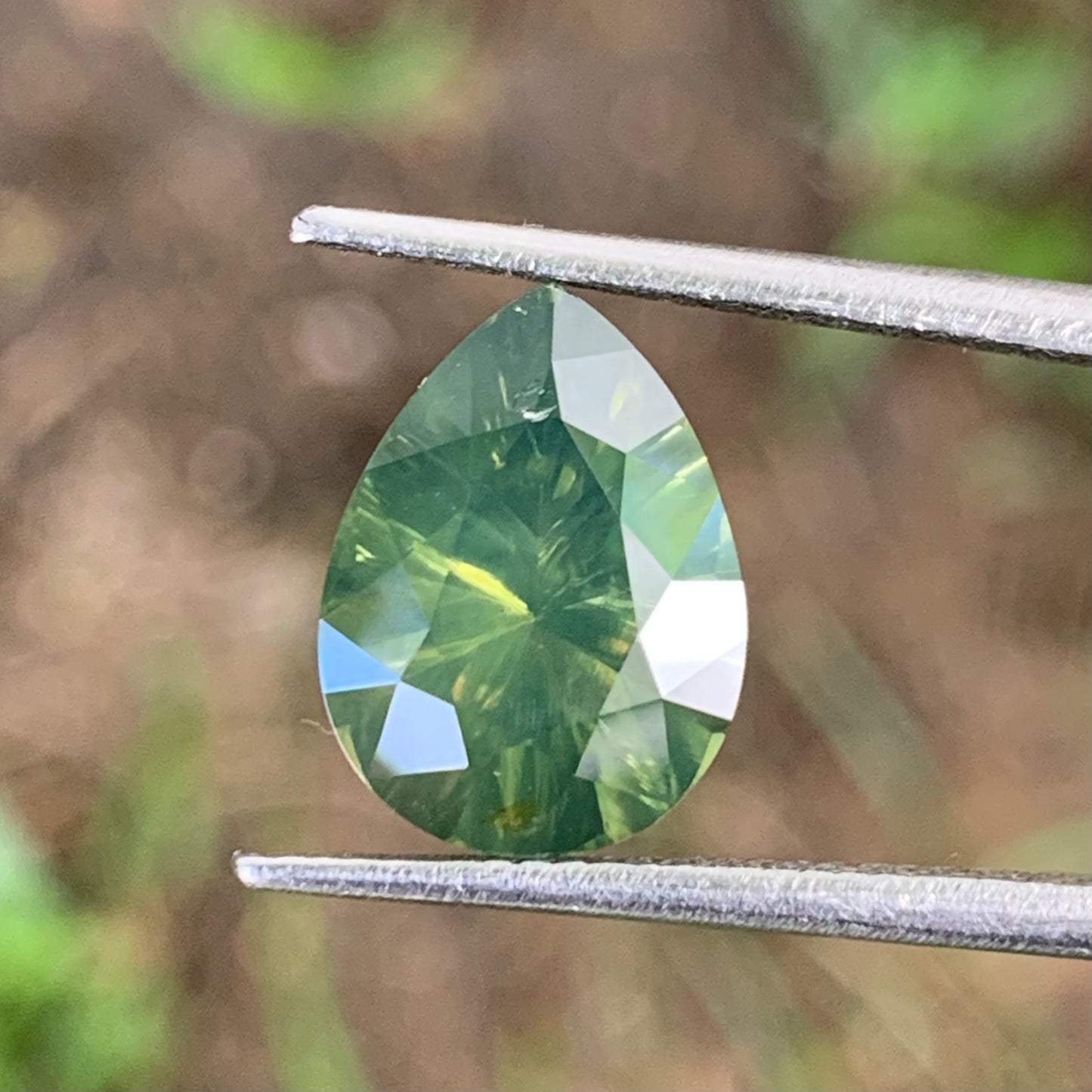 Green Zircon Concave Cut / Fantasy Cut Pear 4.79 Ct Natural Loose Gemstone From Sri Lanka